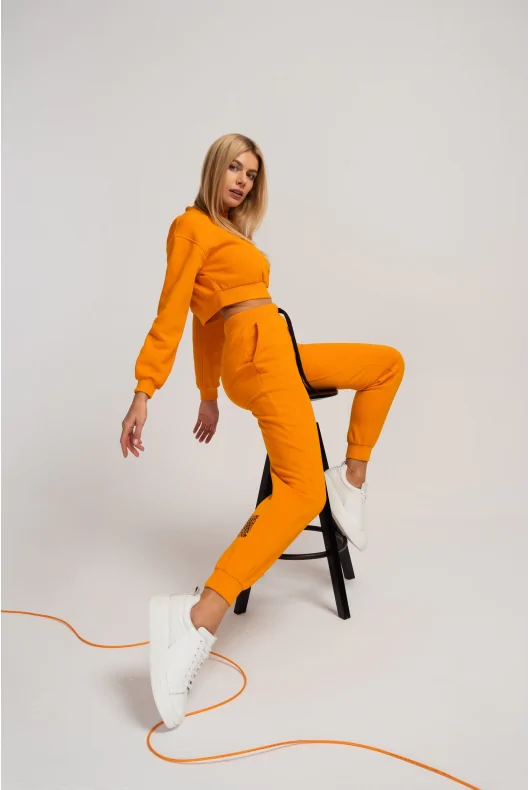 Damskie pomarańczowe spodnie dresowe