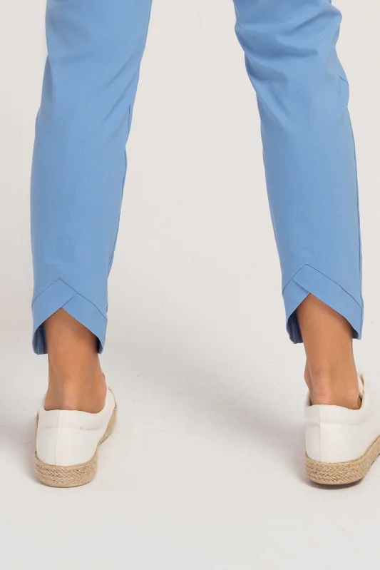niebieskie legginsy na gumie w pasie z wycięciem na nogawce