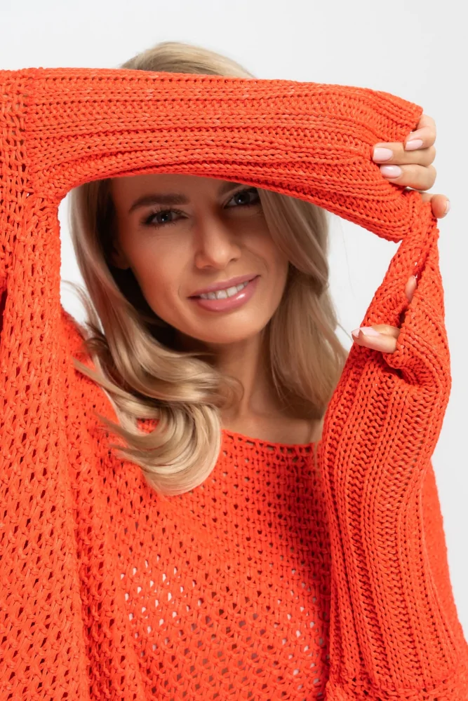 oversizowy sweter ponczo w kolorze pomarańczowym o ażurowym splocie